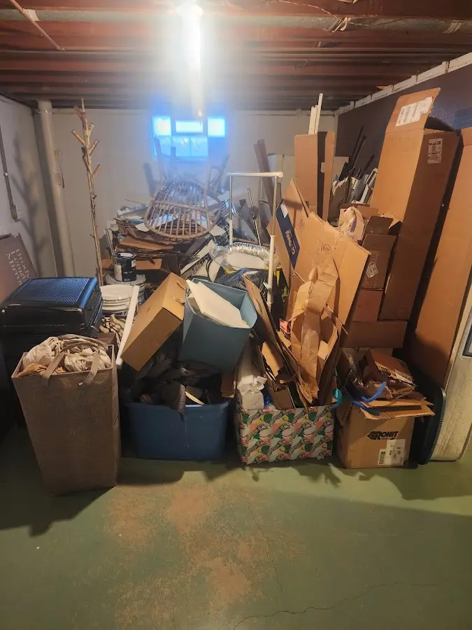 Roll-off dumpster container at job site for Construction Dumpster Rental in Oyster Bay